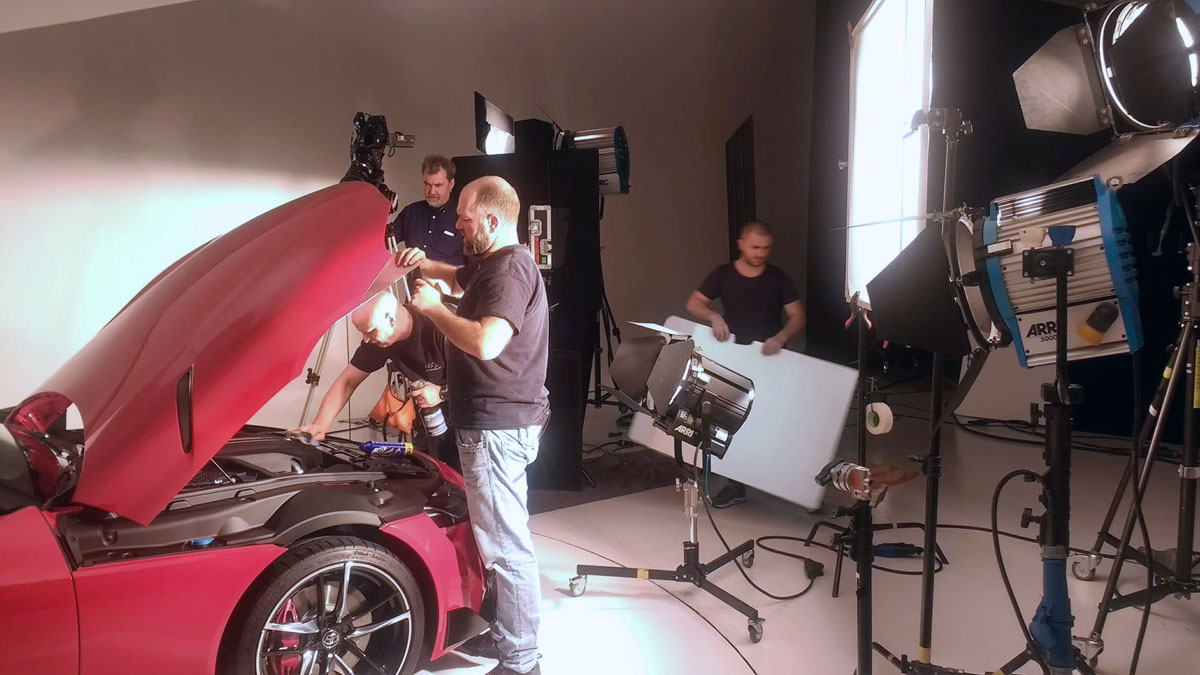 Toyota car turntable studio Vilvoorde Brussels, filming Toyota GR Supra, car technical team and camera crew set up