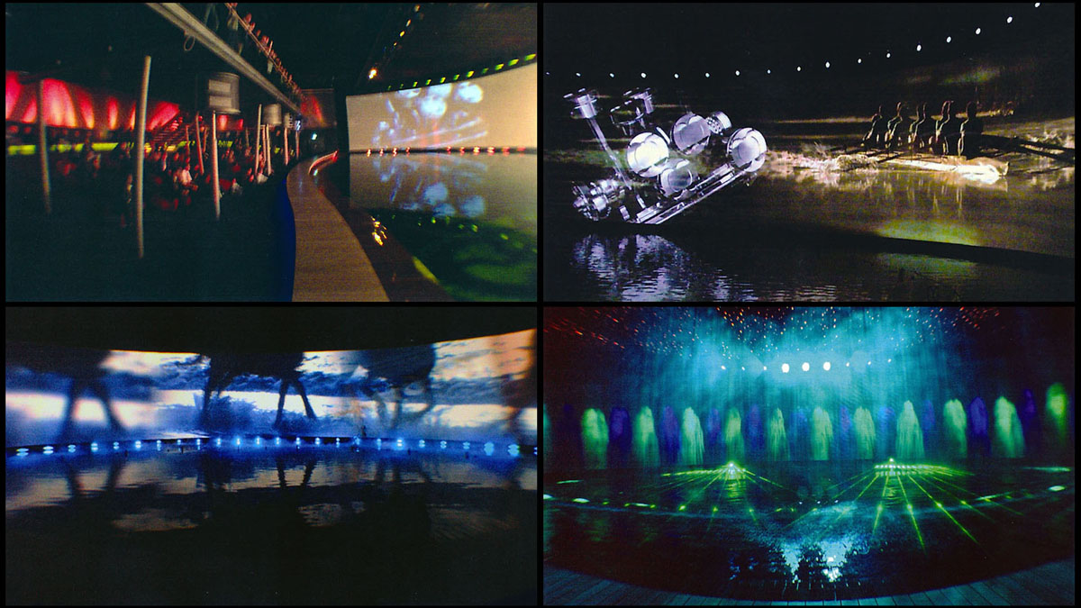 VW Frankfurt motor show inside the black box experiential marketing event, film played on 180° curved screen 54m wide 7m high, in front of a pool of water integrated with water fountains, lasers, dry ice, fire, light and music. 